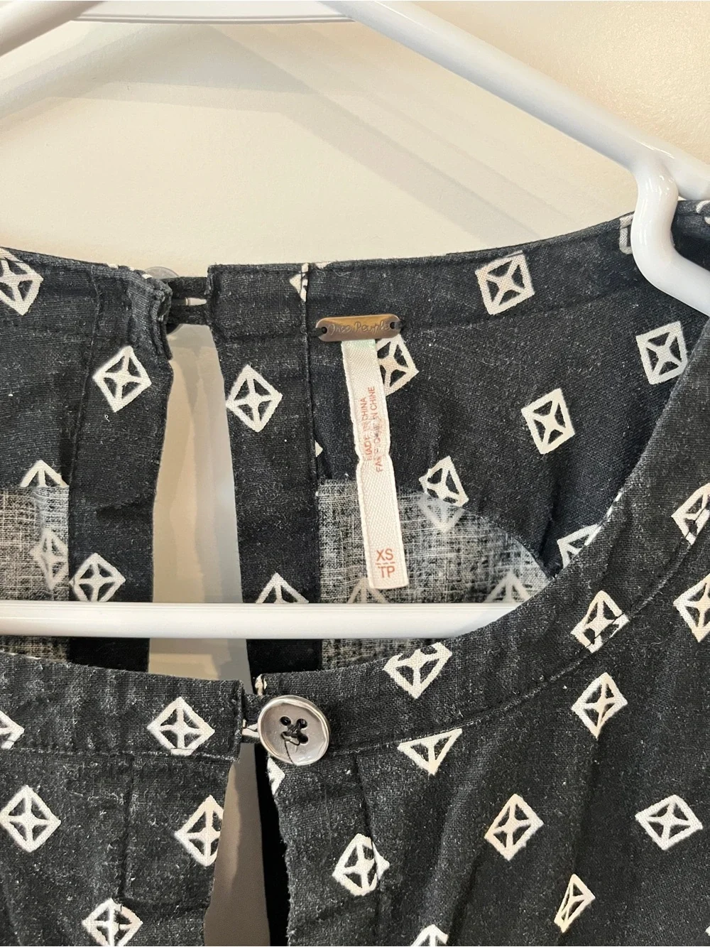 Free People Size XS Black Sleeveless Keyhole Romper w/White Diamond Print
